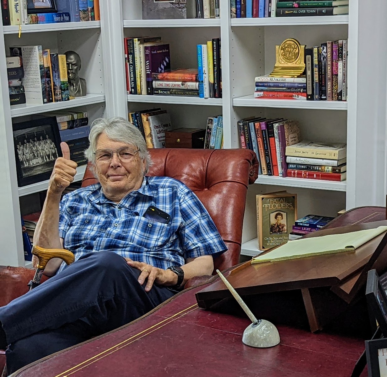 At Pat Conroy's desk summer 2022.jpg
