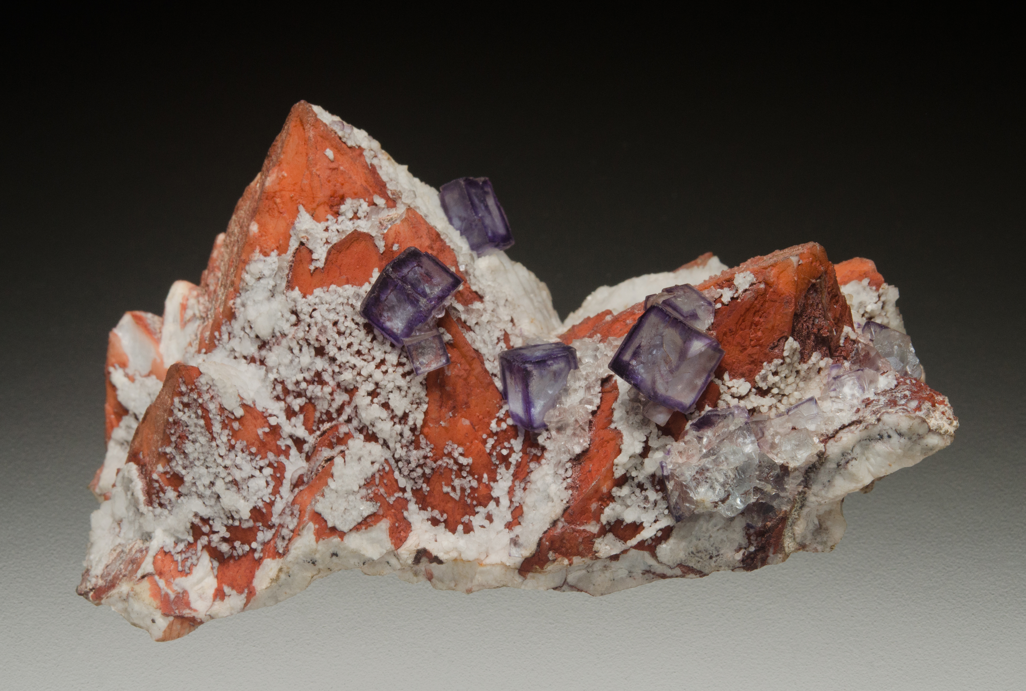 Fig.57 Fluorite on quartz Carn Brea J.Ruskin, A.Russell colln. 120x70x55mm xtls to 8mm.jpg
